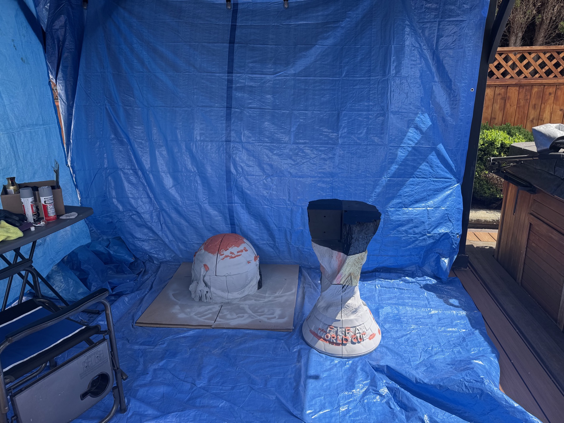 Trophy replica components during priming and painting